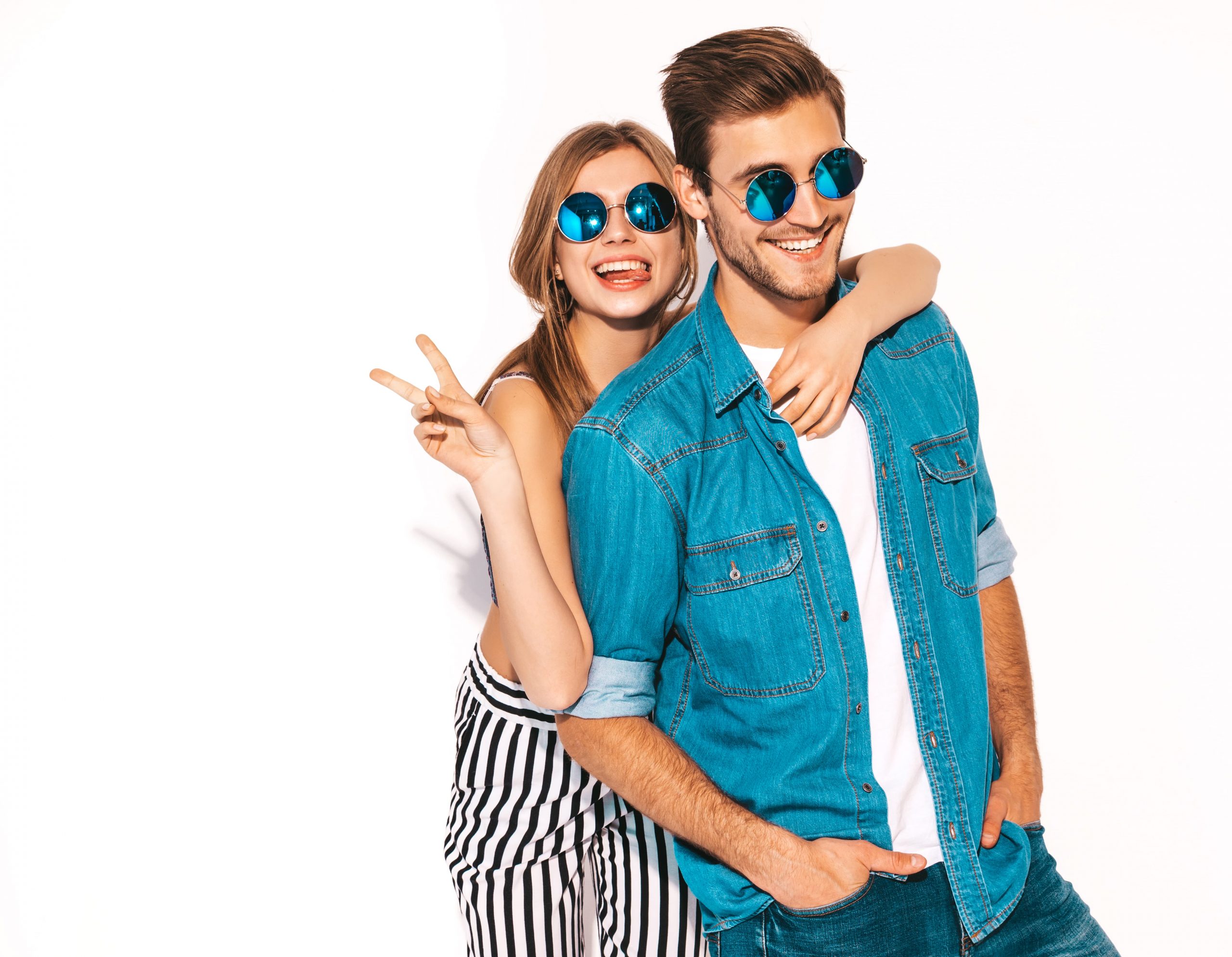 portrait-of-smiling-beautiful-girl-and-her-handsome-boyfriend-laughing-happy-cheerful-couple-in-sunglasses-and-showing-peace-sign (1)